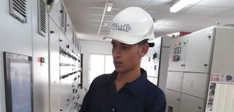Photo of smart water treatment technology operator checking the operation parameters of the sewage treatment plant