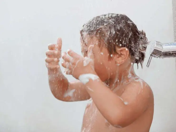 children enjoy shower water